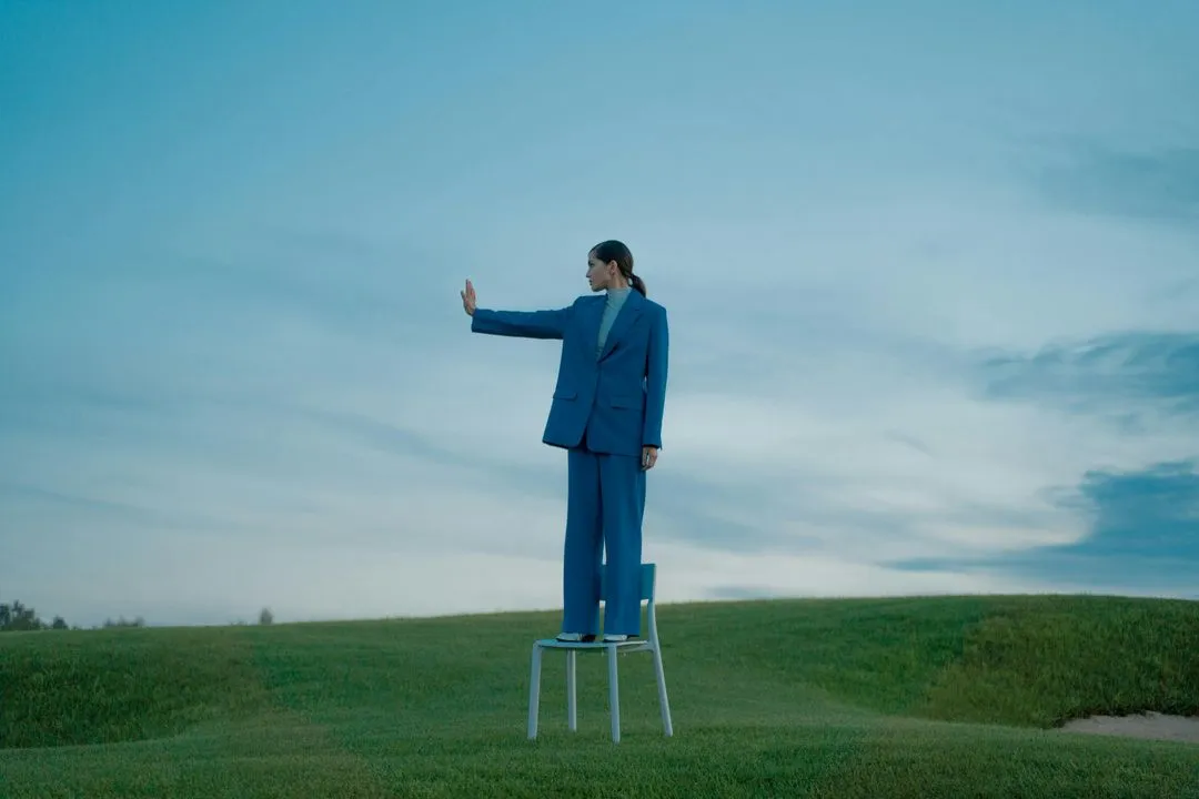Women Standing on the chair