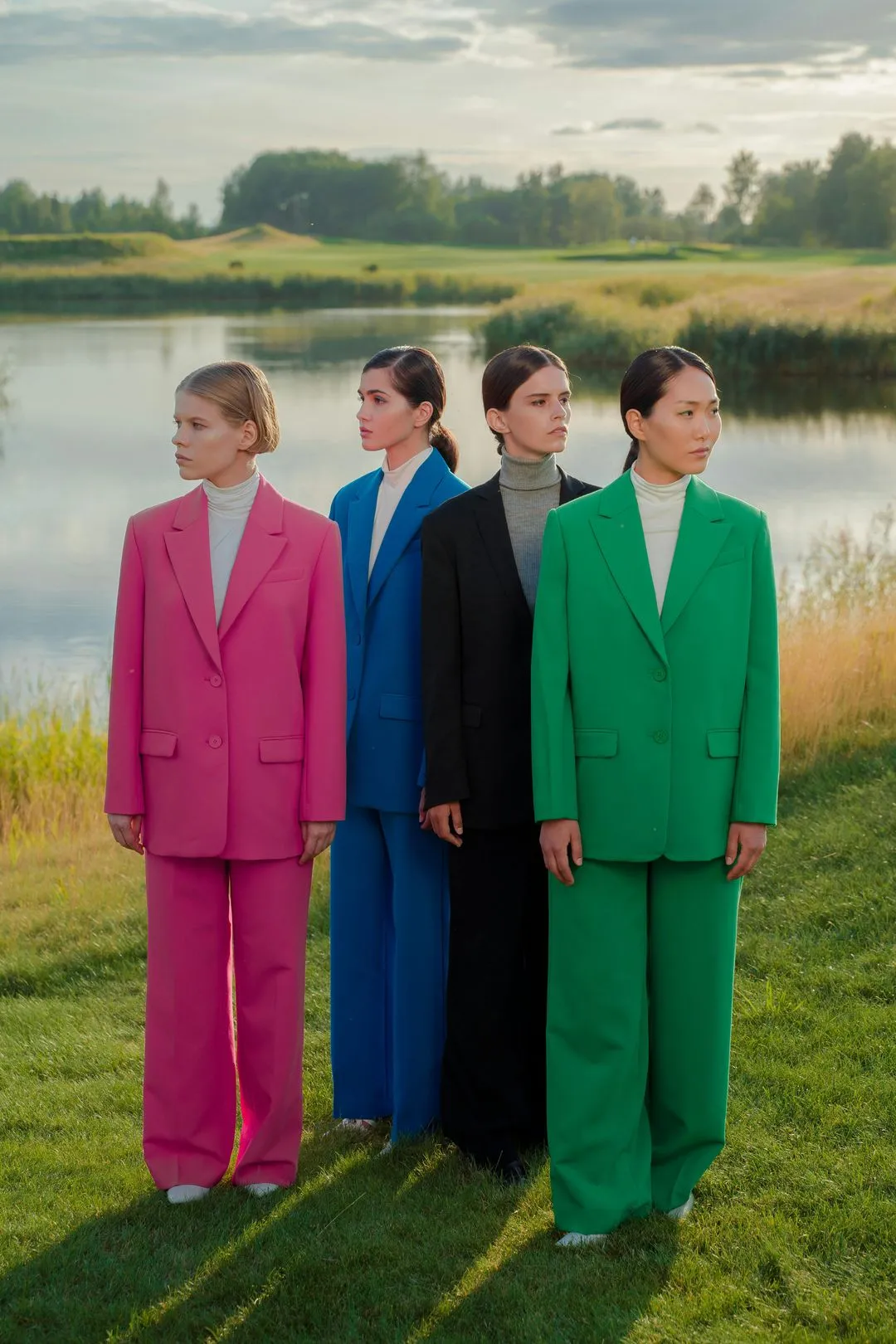 4 Women Standing near the Lake